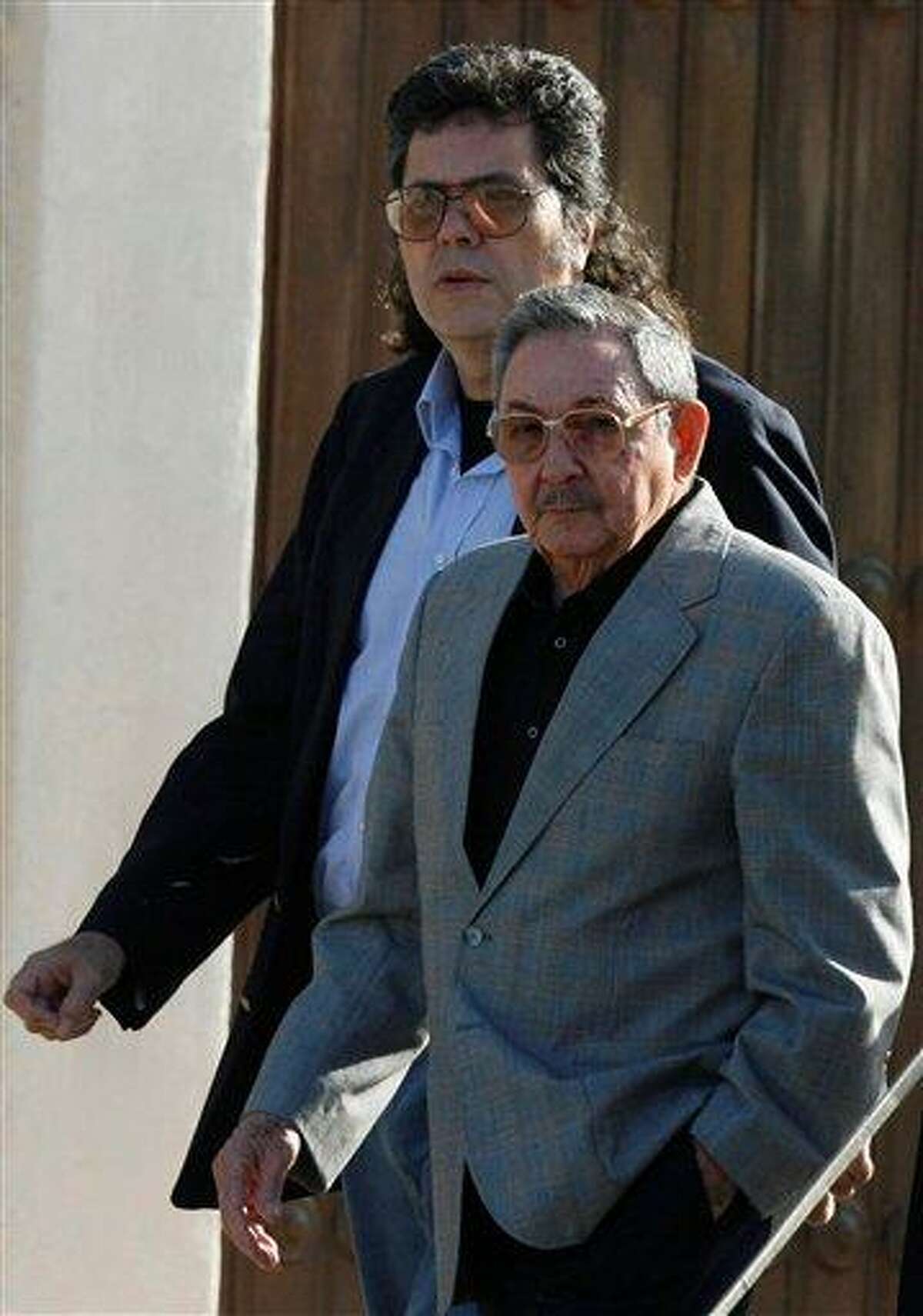 In this 2008 file photo, Cuba's President Raul Castro, right, and Minister of Culture Abel Prieto arrive at the opening ceremony of the International Book Fair in Havana, Cuba. Associated Press