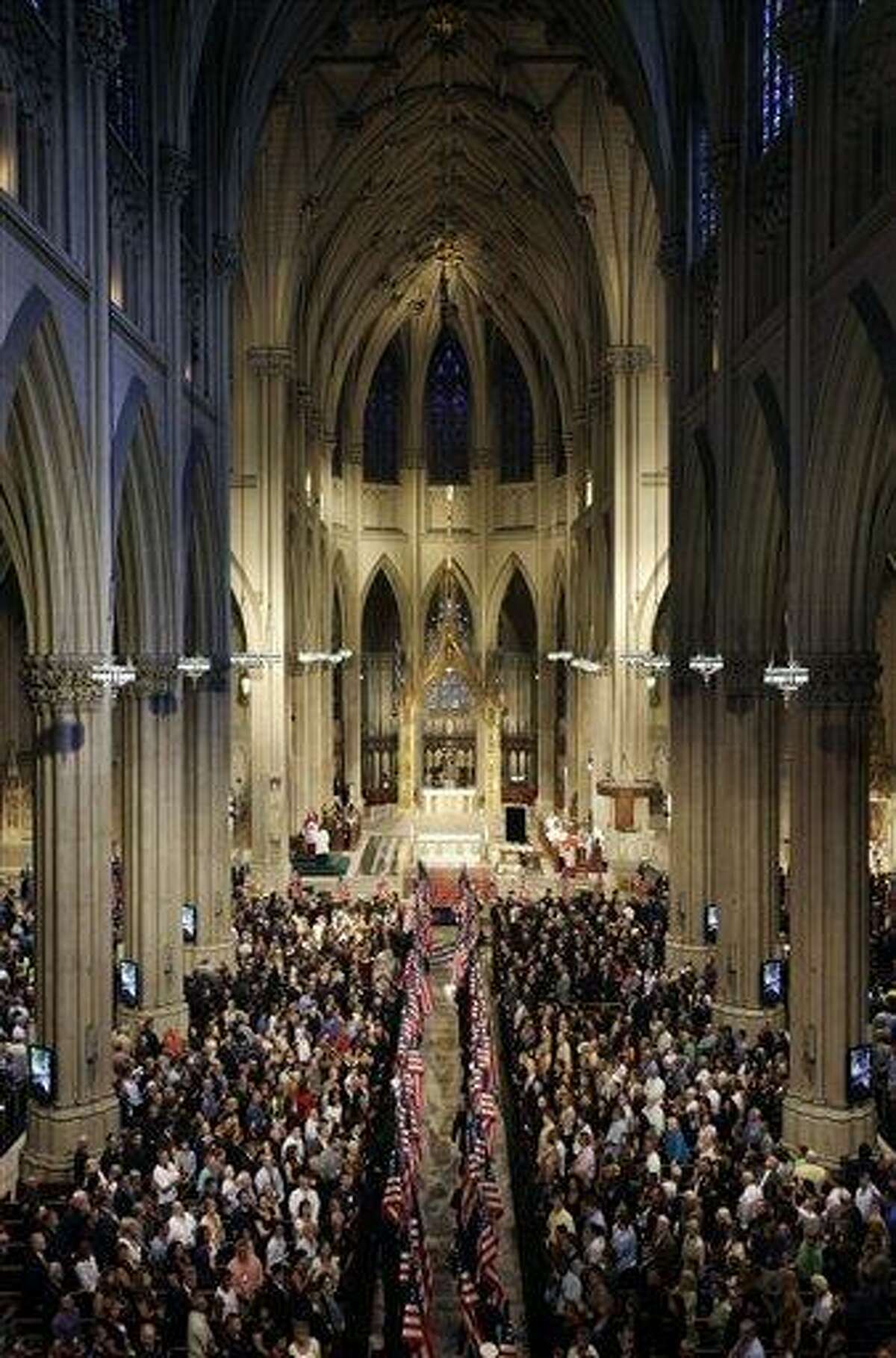 In this 2011 photo, flags are carried into St. Patrick's Cathedral during a ceremony to honor New York firefighters who were killed in the attacks on the World Trade Center in New York. St. Patrick's Cathedral in New York City is embarking on a multimillion-dollar renovation. The $175 million facelift is slated to begin at the end of April and last at least two years. Associated Press