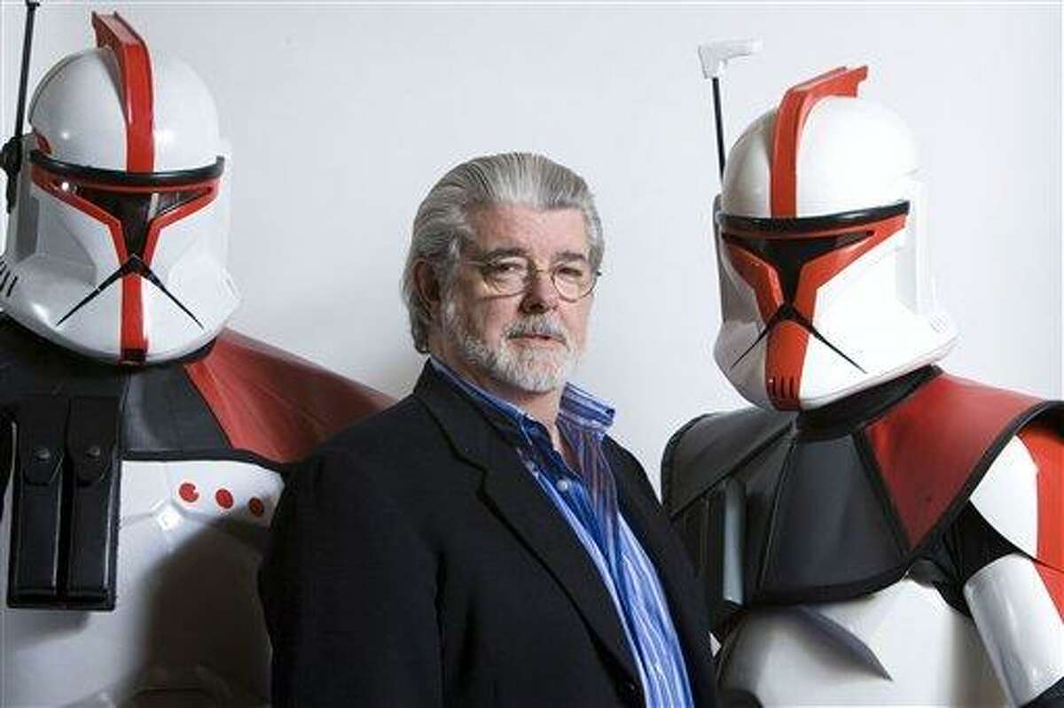 ASSOCIATED PRESS PHOTO FILE - In this March 13, 2008 file photo, director/producer George Lucas poses for portrait in Las Vegas. Lucas wrote and produced the upcoming movie "Star Wars: The Clone Wars."There's no mistaking the similarities. A childhood on a dusty farm, a love of fast vehicles, a rebel who battles an overpowering empire, George Lucas is the hero he created, Luke Skywalker.