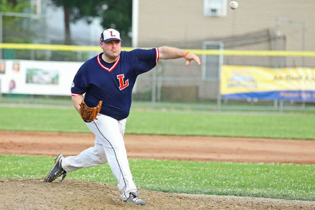 JENNIFER ROYALS/For Register Citizen Litchfield Cowboy pitcher Carl Rivers delivers during the first inning of Wednesday night's All-Star game bewteen the Tri-State Baseball League and the Torrington Titans. The game ended in a 2-2 tie.
