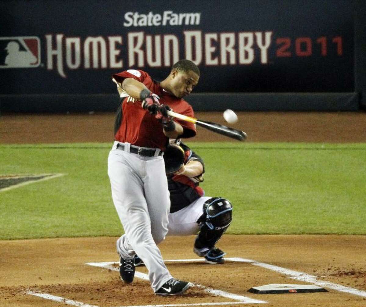 ASSOCIATED PRESS American League's Robinson Cano of the New York Yankees hits during the MLB Home Run Derby Monday in Phoenix. Cano won the derby over Boston's Adrian Gonzalez.
