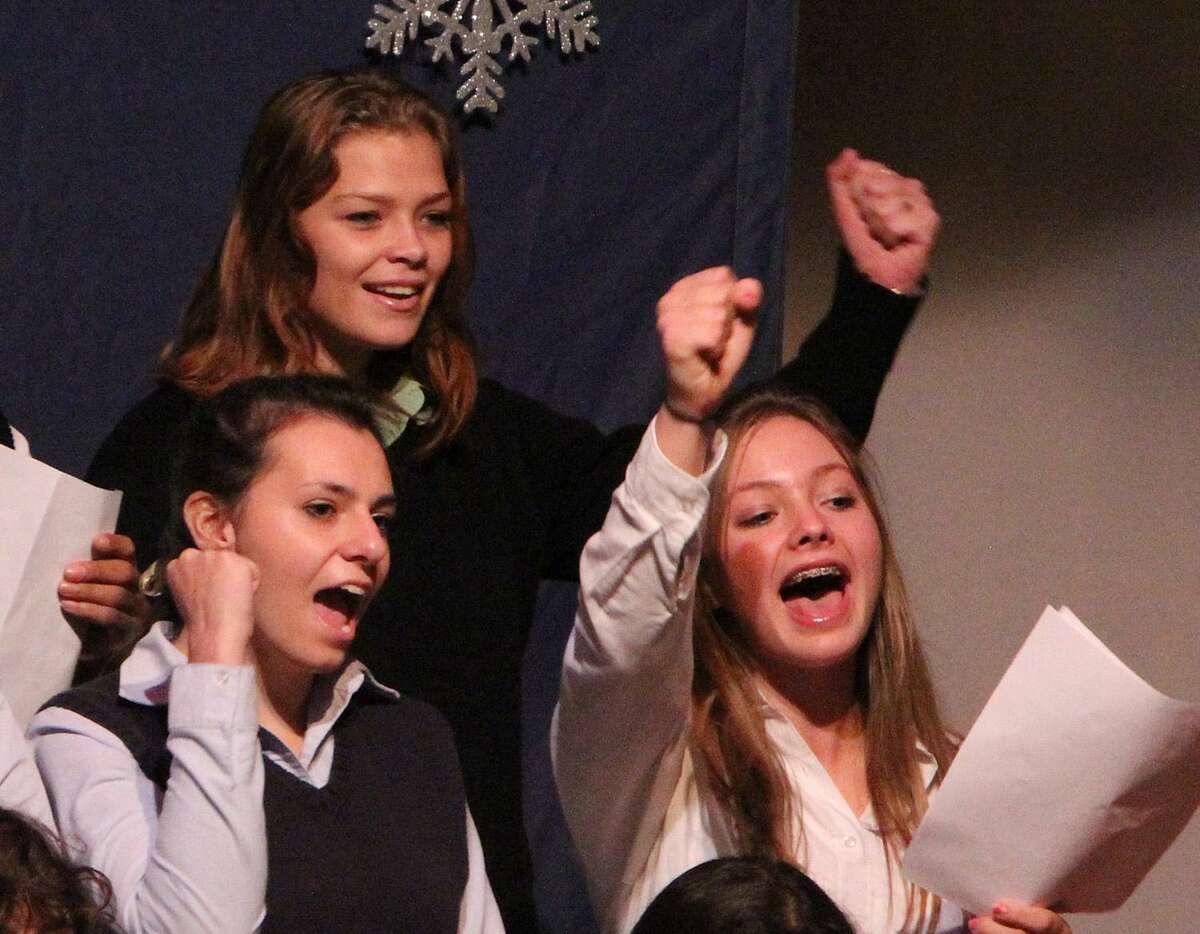 Submitted photo Glenholme School and Shepaug Valley Regional High School students raise their voices in song during a joint concert on Dec. 6.