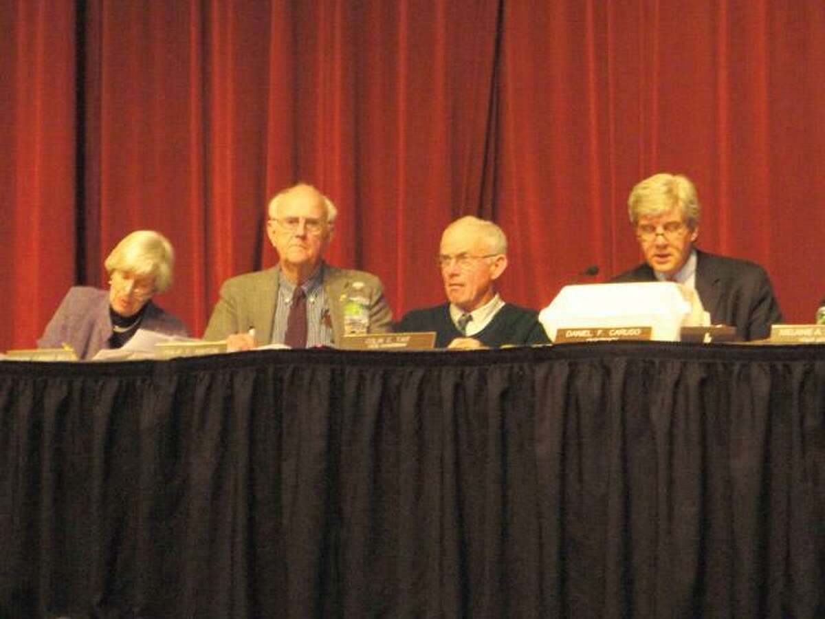 JASON SIEDZIK/ Register CitizenMembers of the Connecticut Siting Council, including chairman Daniel Caruso, right, heard testimony from nearly 30 local residents about BNE Energy's proposed wind turbines in Colebrook.