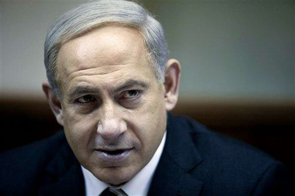 Israeli Prime Minister Benjamin Netanyahu heads the weekly cabinet meeting in his Jerusalem office, Sunday, Dec. 30, 2012. (AP Photo/Abir Sultan, Pool)