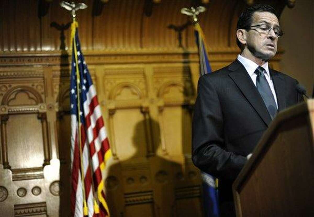 Governor Dannel P. Malloy speaks to the media at the Capitol in Hartford. (AP Photo File Photo/Jessica Hill)