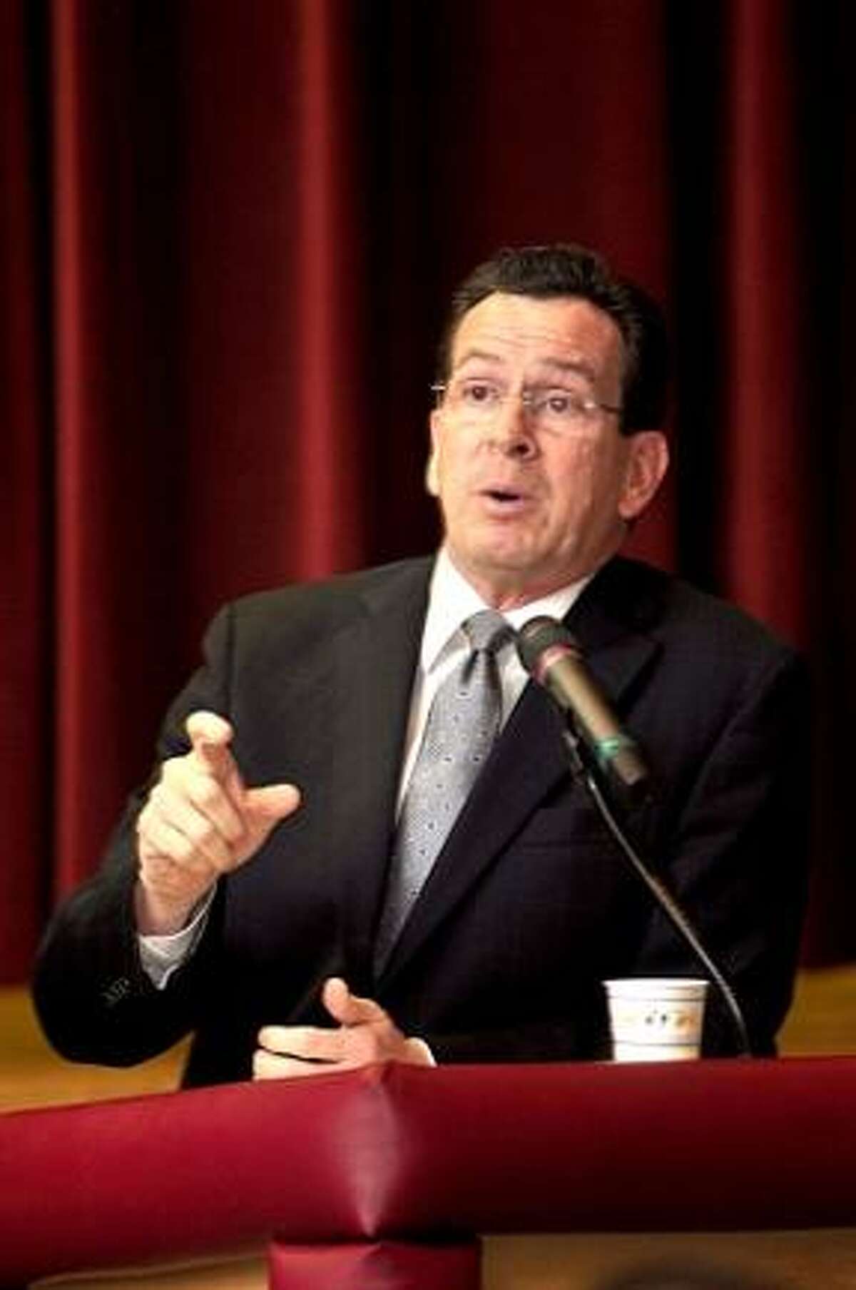 RICK THOMASON / Register Citizen Governor Malloy answers one of the questions from an audience member.