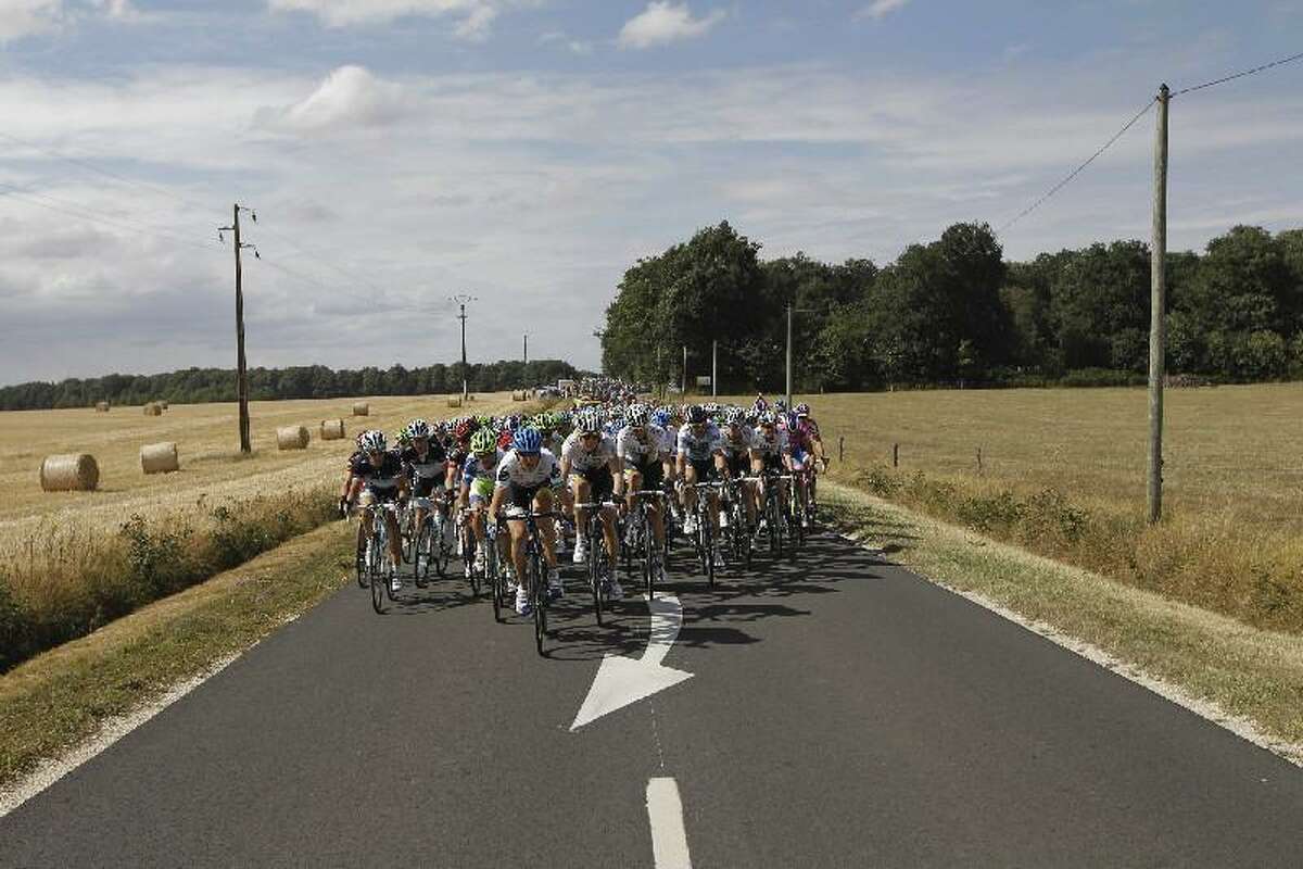 ASSOCIATED PRESS Thankfully there were no cars on the road as the pack rides during the seventh stage of the Tour de France on Friday. Norway's Thor Hushovd continues to lead.