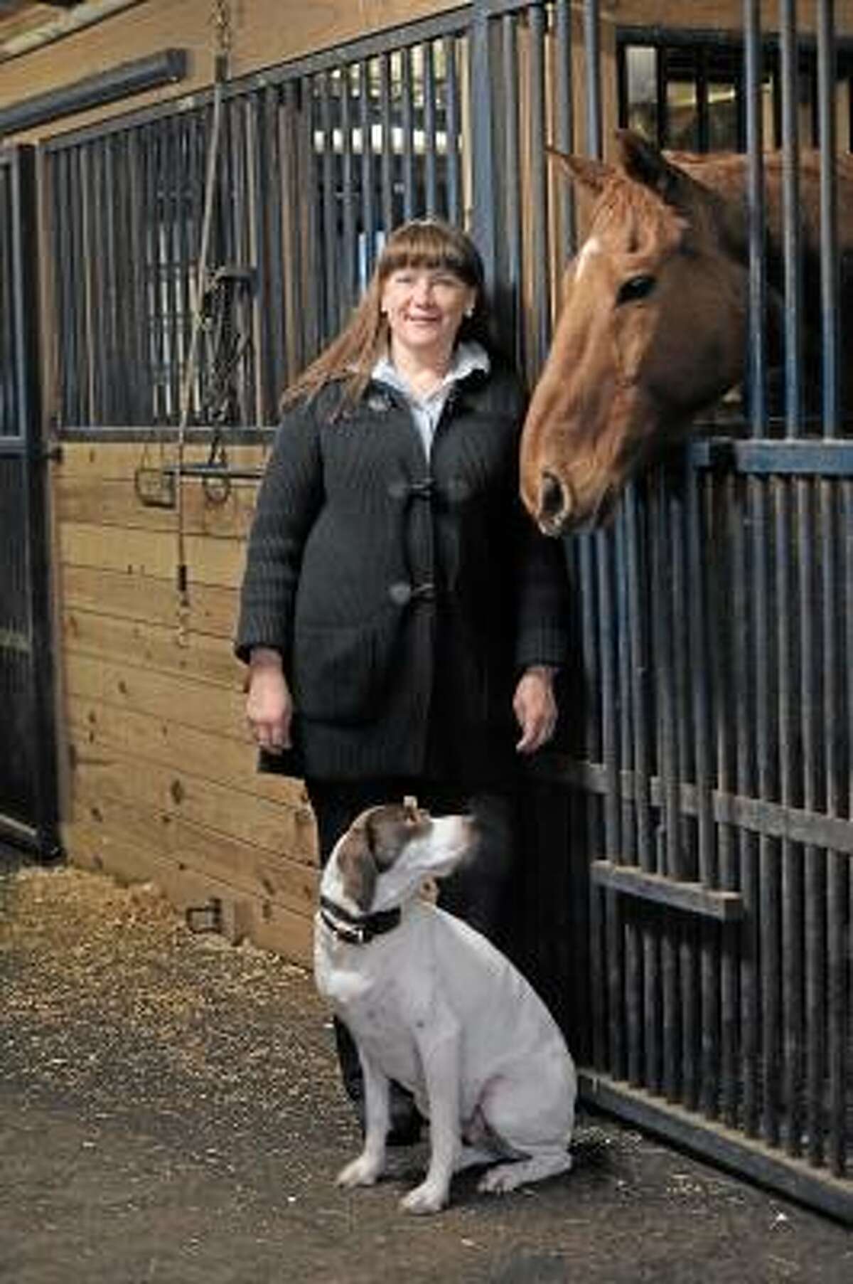 Lynn Taylor and a couple of her four-legged friends.