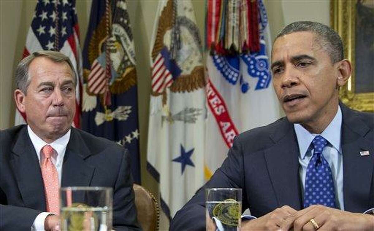President Barack Obama, accompanied by House Speaker John Boehner of Ohio, speaks to reporters Nov. 16 in the Roosevelt Room of the White House in Washington, as he hosted a meeting of the bipartisan, bicameral leadership of Congress to discuss the deficit and economy in Washington. Associated Press file photo