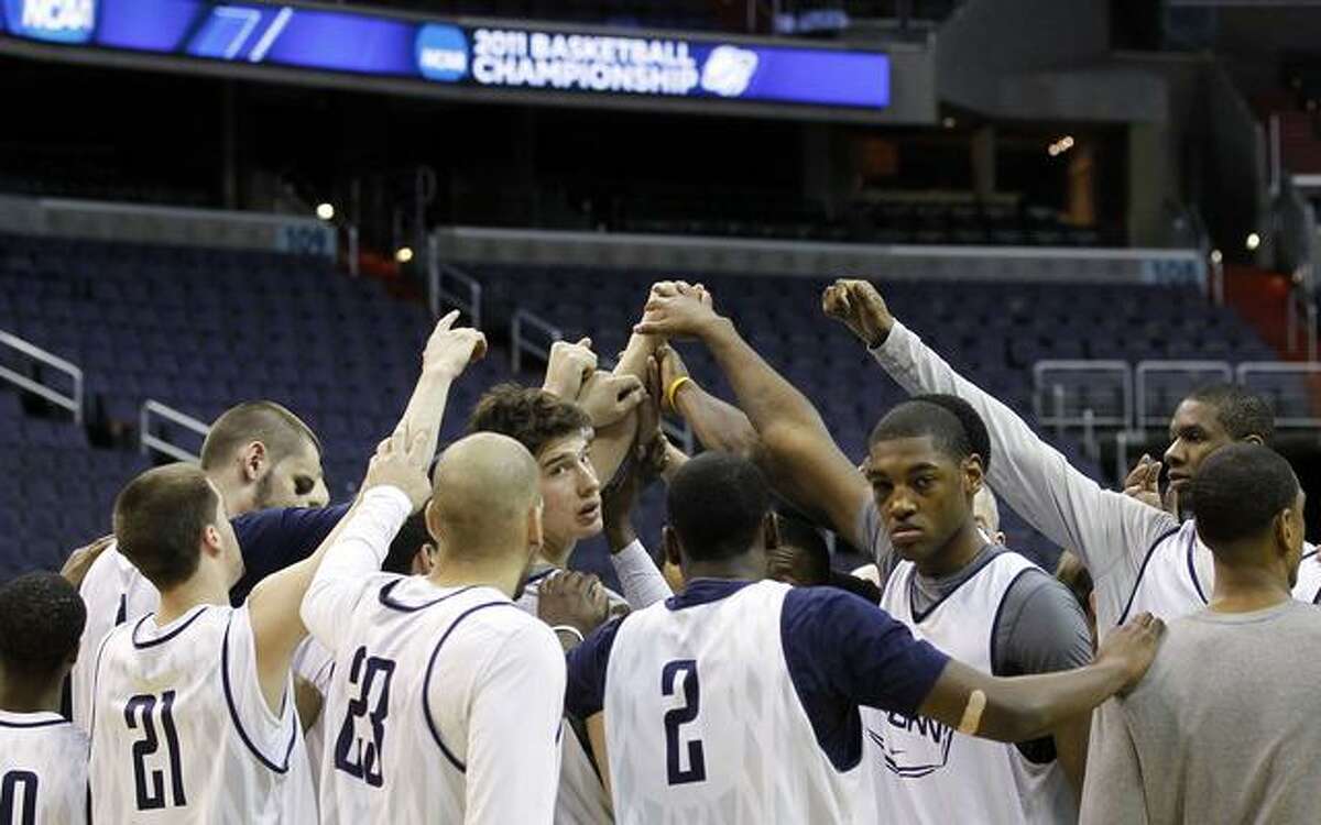 Connecticut players huddle up after practice on Wednesday, March 16, 2011 in Washington, for their west regional NCAA college basketball tournament second round game against Bucknell. (AP Photo)
