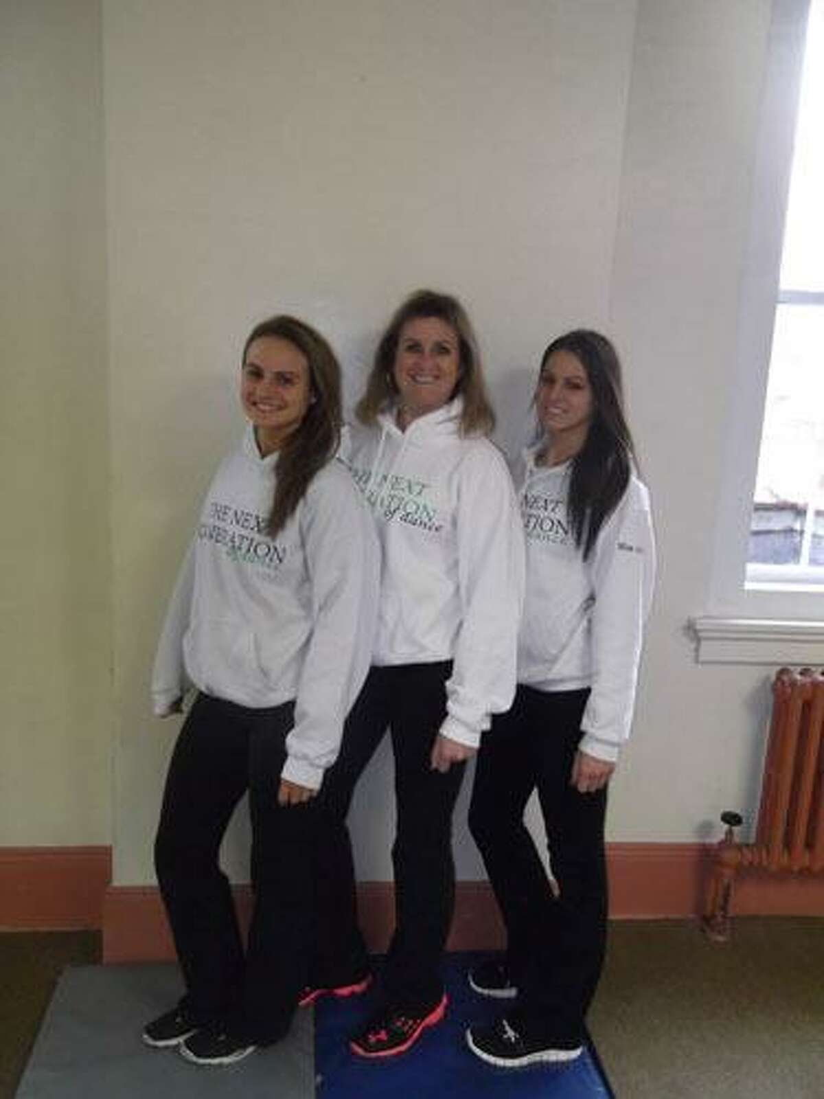 Submitted Photo Sherry Grech (middle) stands with her daughters Jenna Laigle, 23, and Aly Laigle, 22. The mother-daughter team teaches dance classes in several surrounding towns and support and work off each other through their love of dance.