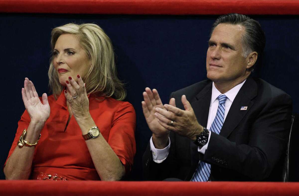 Republican presidential nominee Mitt Romney and his wife Ann applaud during New Jersey Governor Chris Christie's speech at the Republican National Convention in Tampa, Fla., on Tuesday, Aug. 28, 2012. (AP Photo/Charlie Neibergall)