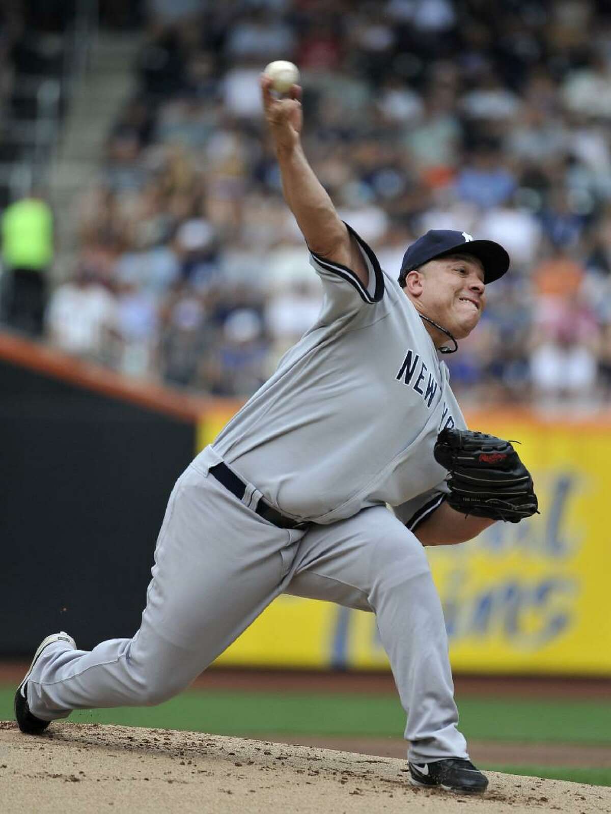 Bartolo Colon pitches well in first game back off DL, leads Yanks