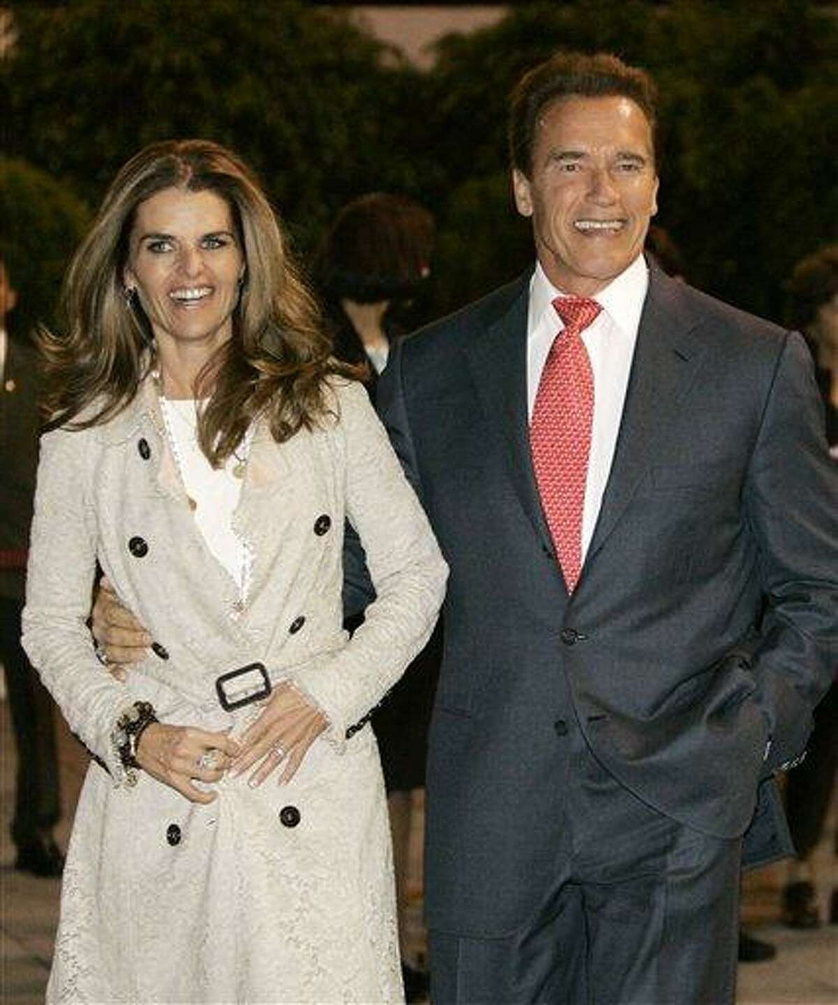 FILE - In this Nov. 8, 2006 file photo, California Gov. Arnold Schwarzenegger arrives in Mexico City, Mexico, with his wife Maria Shriver. Maria Shriver has filed for divorce from Arnold Schwarzenegger in Los Angeles Superior Court, Friday, July 1, 2011. (AP Photo/Marcio Jose Sanchez, file)