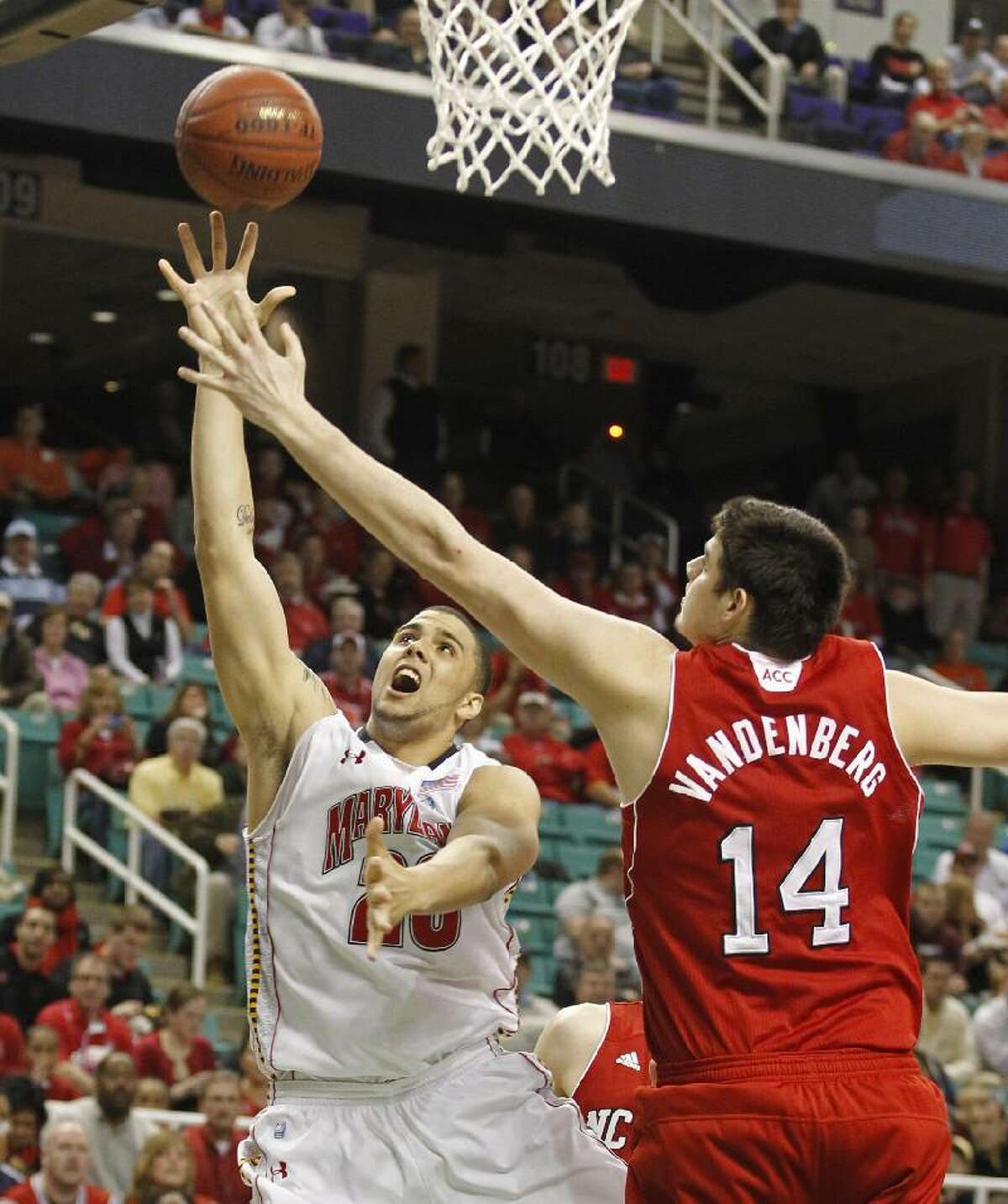 ASSOCIATED PRESS FILE PHOTO Maryland's Jordan Williams (20) shoots over North Carolina State's Jordan Vandenberg (14) in the first half of an Atlantic Coast Conference tournament game in Greensboro, N.C., on March 10. Williams was taken in the second round by the New Jersey Nets with the 36th pick.