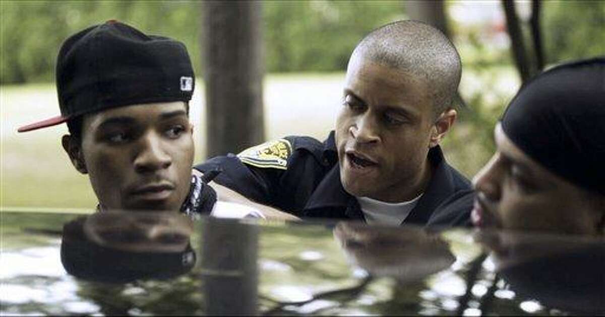 This undated still image from video, released by director Rashad Frett, shows a scene from an upcoming television police drama "The Second District," set in Hartford. Hartford police officer Mark Manson took inspiration from his experiences to create the show with a career criminal he met on the job. The show is expected to debut in fall 2012 through a syndication deal bringing it to networks in areas including Chicago, New York and Los Angeles. Associated Press