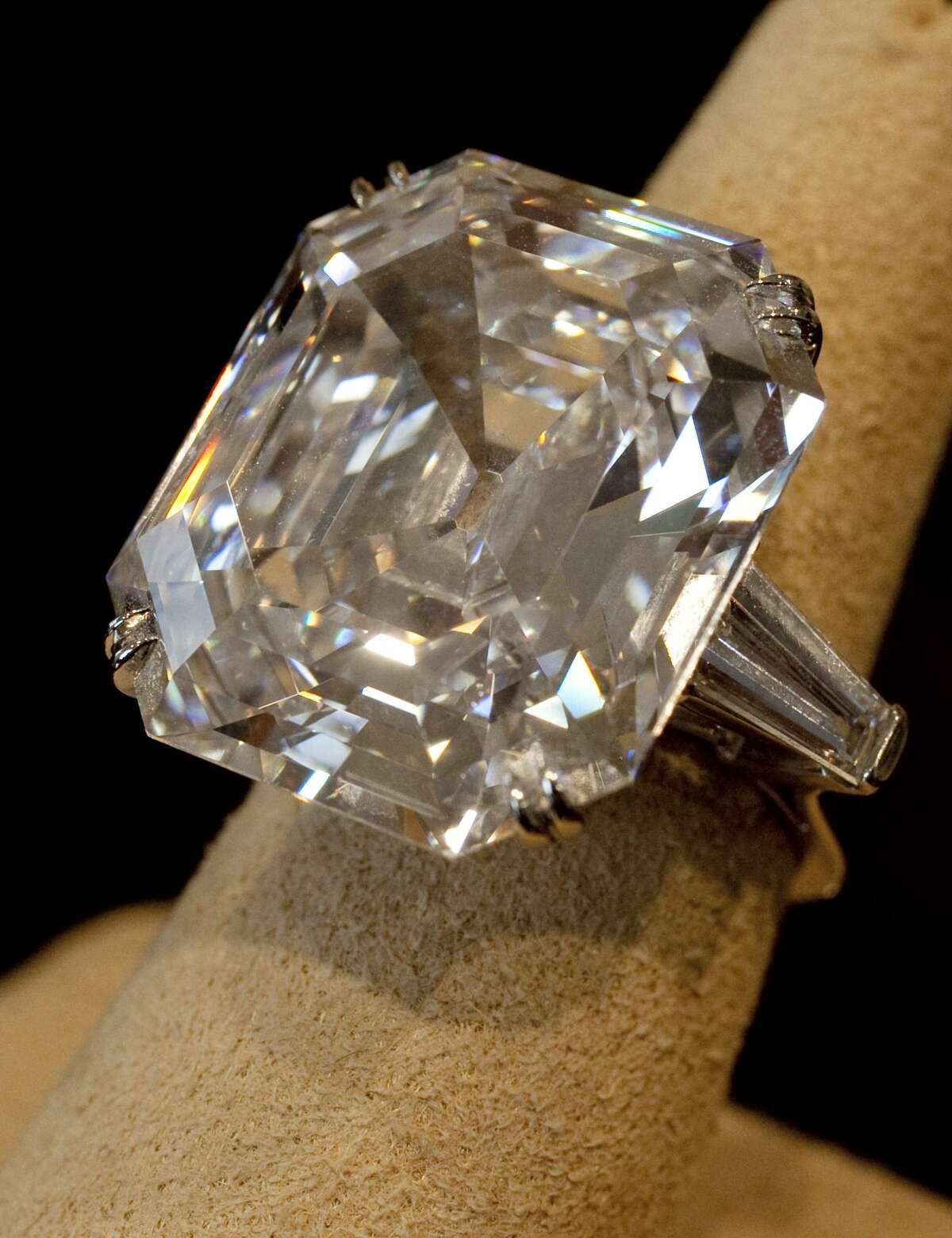 This Sept. 1, 2011, file photo shows "The Elizabeth Taylor Diamond," a 33.19 carat a gift to the actress from Richard Burton at Christie's, in New York. The ring given to Elizabeth Taylor by actor Richard Burton sold for over $8.8 million at auction in New York Tuesday. (AP Photo/Richard Drew, File)