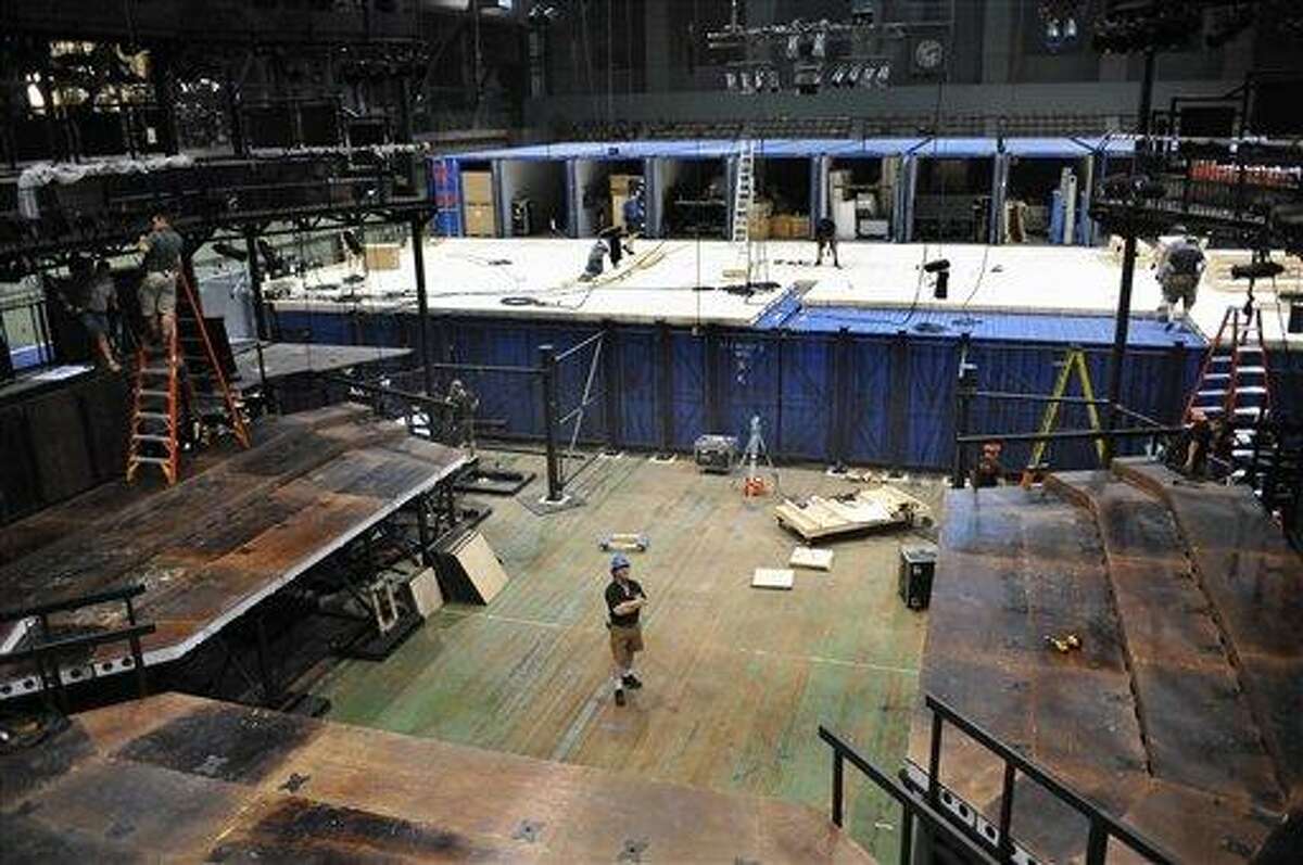 In this June 23, 2011 photo released by Lincoln Center Festival, workers construct a full-scale replica of the Royal Shakespeare Theatre in Stratford-upon-Avon at the Park Avenue Armory in New York for five Shakespeare plays, "As You Like It," "Julius Caesar," "King Lear," "Romeo and Juliet," and "The Winter's Tale." (AP Photo/Lincoln Center, Stephanie Berger)