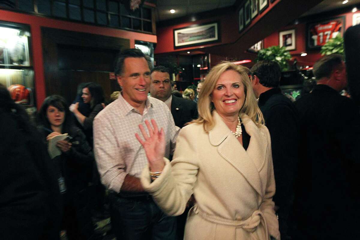Republican presidential candidate, former Massachusetts Gov. Mitt Romney and his wife Ann greet patrons at the Montgomery Inn in Cincinnati, Ohio, Saturday, March 3, 2012. Mitt Romney stepped out to a solid lead over his Republican presidential rivals Saturday night in Washington state caucuses, a quiet prelude to 10 Super Tuesday contests next week in all regions of the country. (AP Photo/Gerald Herbert)