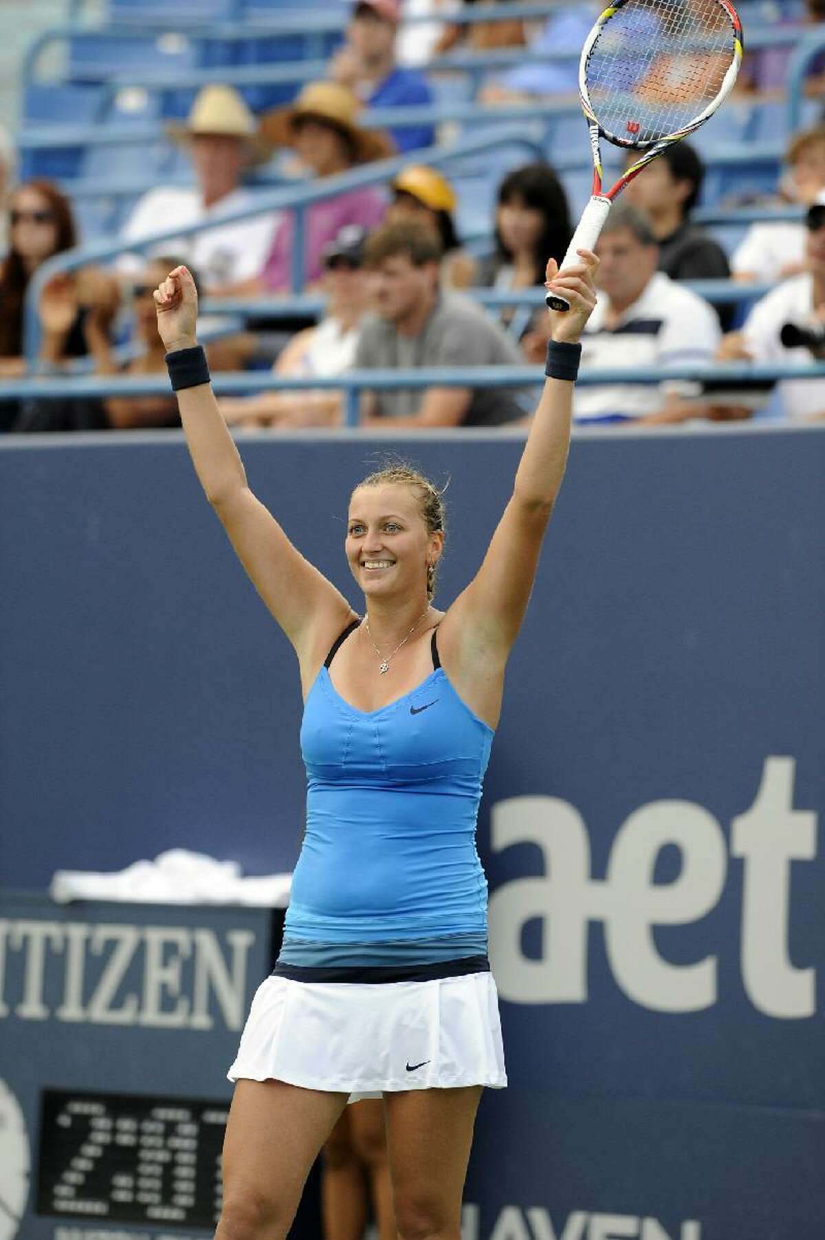 ASSOCIATED PRESS Petra Kvitova, of the Czech Republic, celebrates after her 7-6 (9), 7-5 victory over Maria Kirilenko, of Russia, in the title match of the New Haven Open tennis tournament in New Haven on Saturday.