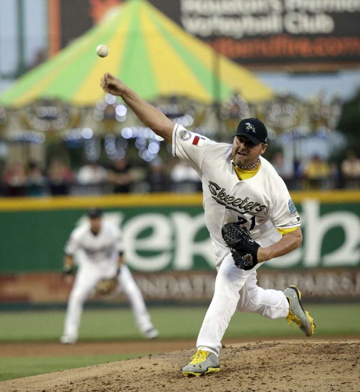ASSOCIATED PRESS Sugar Land Skeeters pitcher Roger Clemens throws a pitch during a game against the Bridgeport Bluefish Saturday in Sugar Land, Texas. Clemens, a seven-time Cy Young Award winner, signed with the Skeeters of the independent Atlantic League this week.