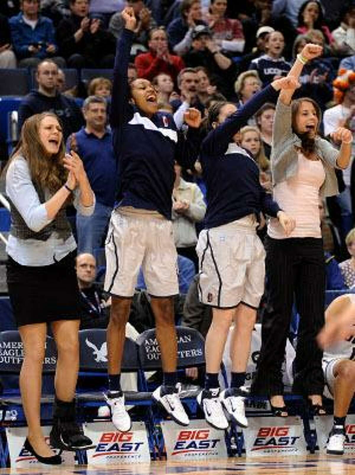 AP Connecticut players react late in the second half of their 73-64 victory over Notre Dame in the Big East Championship final on March 8 in Hartford. The Huskies are the No. 1 overall seed in the women's NCAA tournament. UConn is the top seed in Philadelphia and will play its first two games in Storrs at Gampel Pavilion. UConn's first game is against Jennifer Rizzotti and No. 16 Hartford Sunday at noon at Gampel Pavilion on ESPN2.
