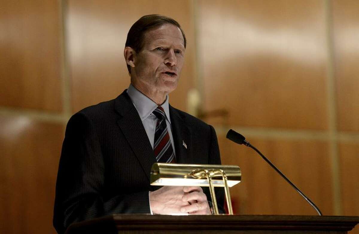 U.S. Sen. Richard Blumenthal speaks to mourners at a vigil service for victims of the Sandy Hook Elementary School shooting, at the St. Rose of Lima Roman Catholic Church in Newtown, Conn. Friday, Dec. 14, 2012. A man killed his mother at their home and then opened fire Friday inside the elementary school where she taught, massacring 26 people, including 20 children, as youngsters cowered in fear to the sound of gunshots reverberating through the building and screams echoing over the intercom (AP Photo/Andrew Gombert, Pool)