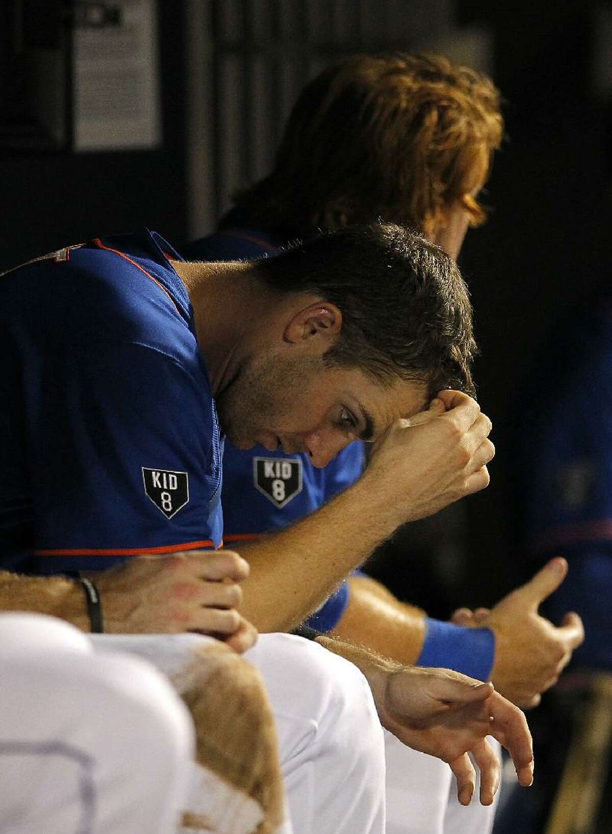 ASSOCIATED PRESS New York Mets' David Wright sits in the dugout while waiting for the final out in the ninth inning of a Mets 3-1 loss to the Houston Astros at Citi Field in New York on Friday.