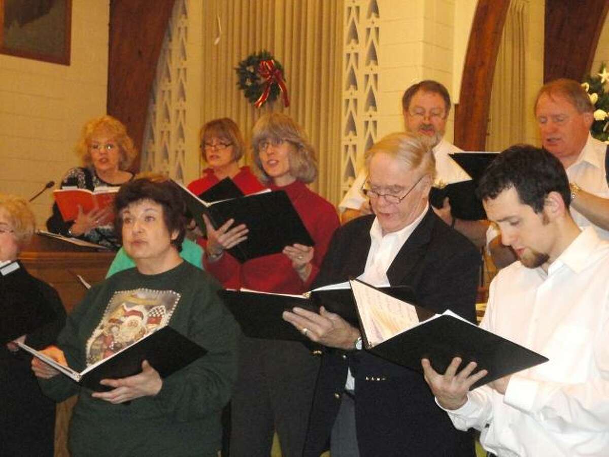 JASON SIEDZIK/Register Citizen Members of the Connecticut Yankee Chorale rehears for their concert, "Christmastime is Here!" which they will perform this afternoon at the First United Methodist Church on Fern Drive, at 3 p.m. The Torrington High School Select Chorus will join the Chorale during the performance. General admission is $12 and tickets for those 12 and under and seniors will be $10. Tickets are available from members of CYC and will also be available at the door. Audience members are asked to bring non-perishable food donations for the Friendly Hands Food Bank. For further information please call 482-5743.