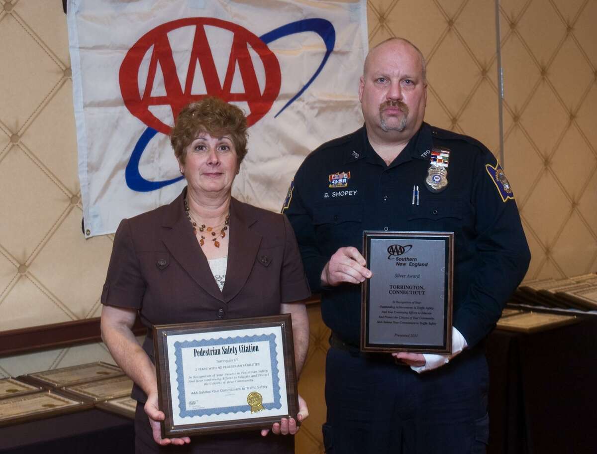 Submitted photo In its second Annual Community Traffic Safety Award Program lunch at the Trumbull Marriott, Public Affairs Manager Fran Mayko presented Torrington Lieut. Robert Shopey with a national Silver Award for the department's comprehensive traffic safety programs.