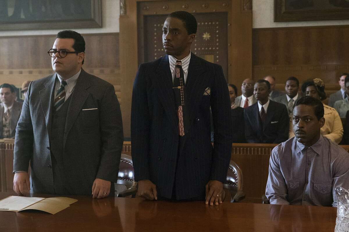 This image released by Open Road Films shows, from left, Josh Gad, Chadwick Boseman and Sterling K. Brown in a scene from "Marshall." (Barry Wetcher/Open Road Films via AP)