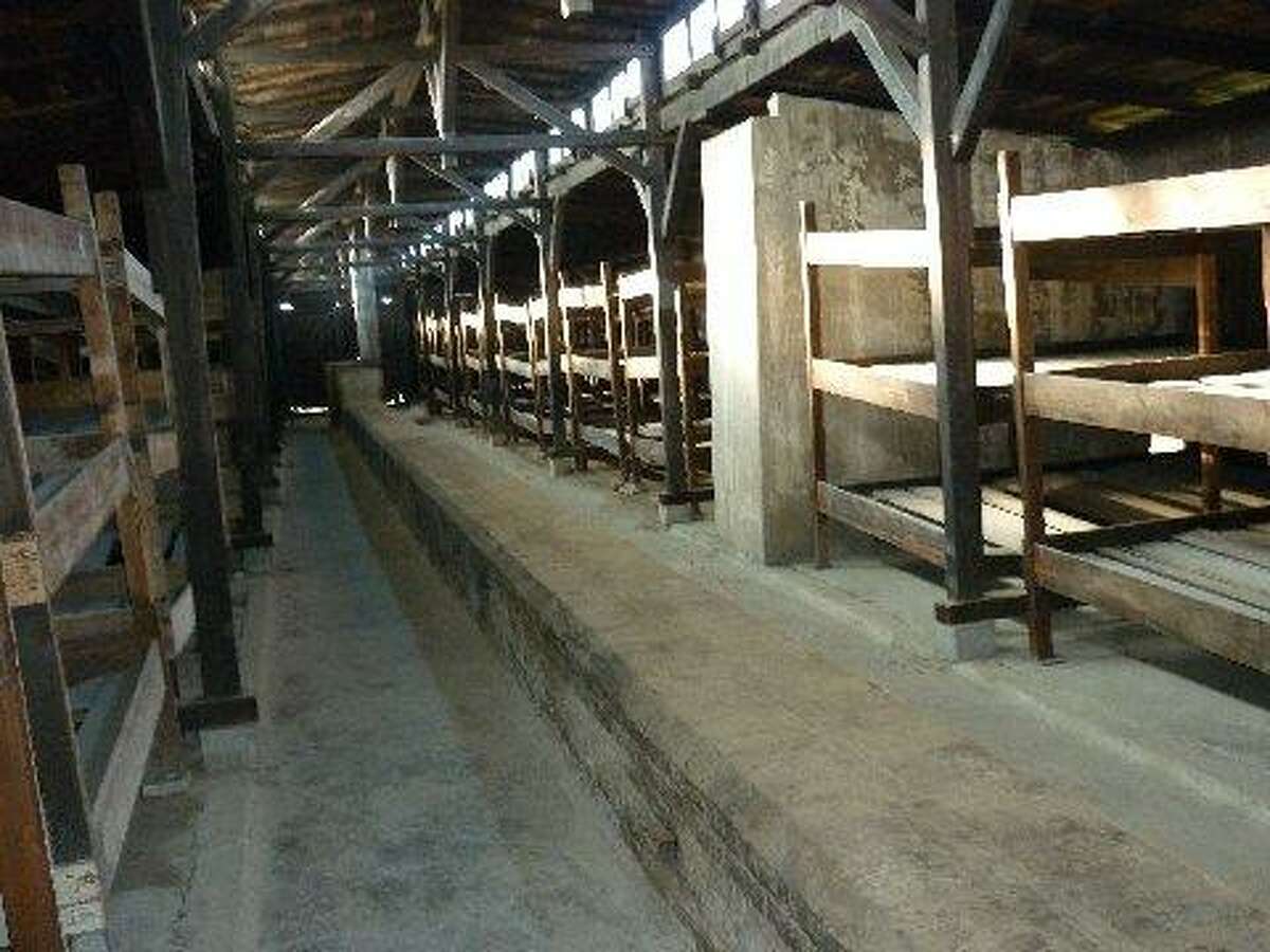 Bunk beds in Auschwitz. There were typically four inmates per bunk.