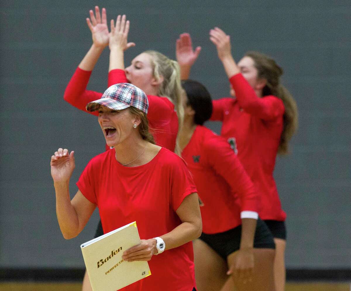 The Woodlands head coach Terri Wade yells after a block in the third set of a match during the Adidas John Turner Classic at Pearland High School, Saturday, Aug. 12, 2017, in Pearland. The Woodlands defeated Prosper 2-1.