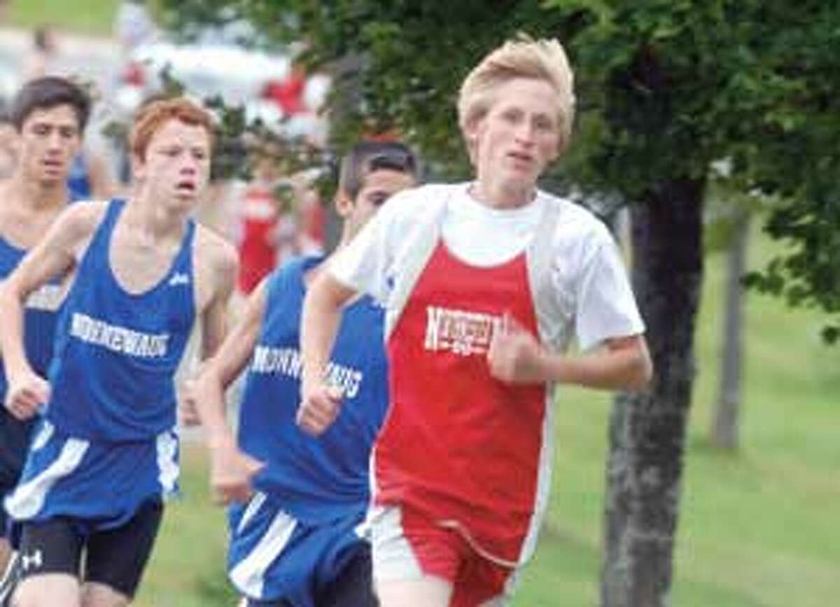 Northwestern's Matthew Hodgkin leads the pack at the start of Tuesday's cross country meet with Nonnewaug in Winsted. Hodgkin finished sixth overall.