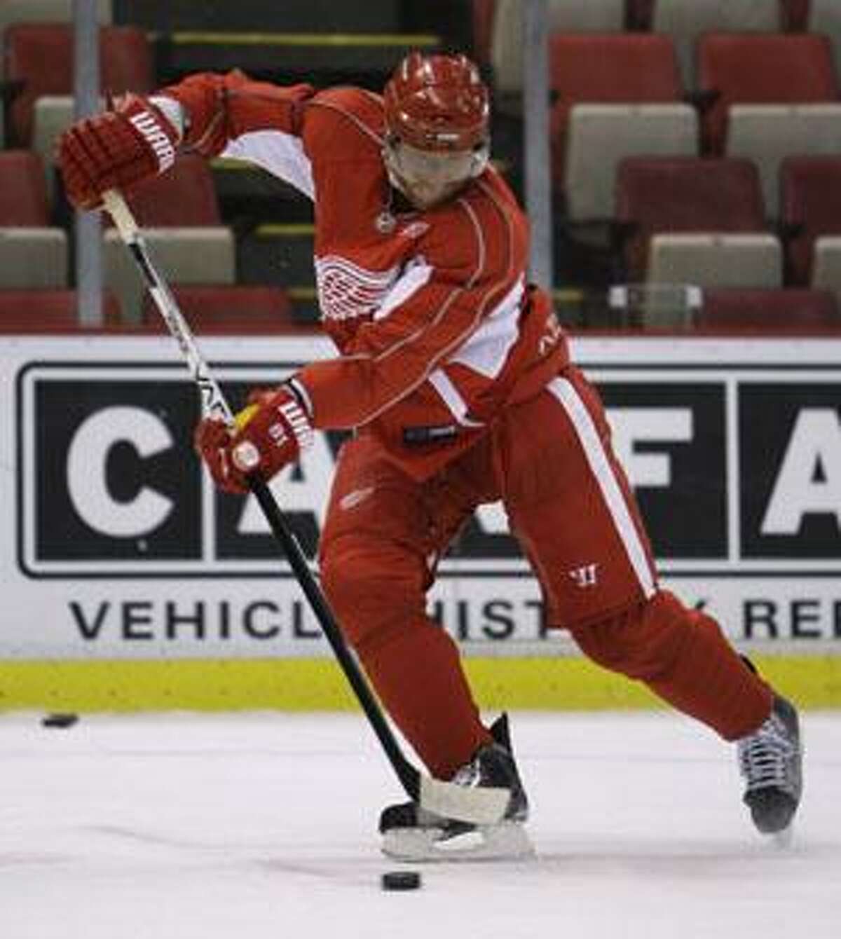 Detroit Red Wings forward Marian Hossa moves the puck during practice in Detroit Friday. Game 1 of the Stanley Cup Finals on Saturday will match the Red Wings against the Pittsburgh Penguins. (AP Photo/Paul Sancya)