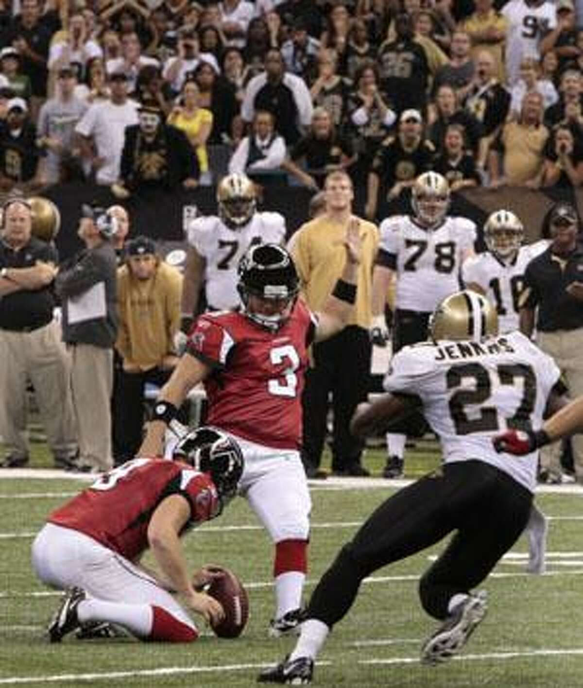 Atlanta Falcons place kicker Matt Bryant (3) kicks the game winning field goal over the New Orleans Saints in overtime of their NFL football game at the Louisiana Superdome in New Orleans, La., Sunday, Sept. 26, 2010. The Falcons won 27-24. (AP Photo/Bill Haber)