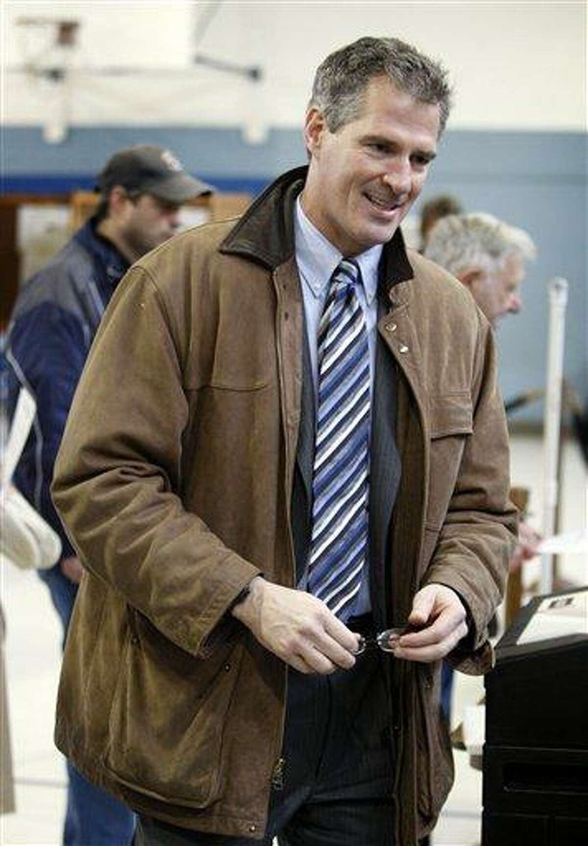Massachusetts State Senator Scott Brown, R-Wrentham, votes in Wrentham, Mass., Tuesday, Jan. 19, 2010. Brown is running against Democrat Martha Coakley in a special election to fill the U.S. Senate seat left empty by the death of Sen. Edward M. Kennedy, D-Mass. (AP Photo/Robert F. Bukaty)