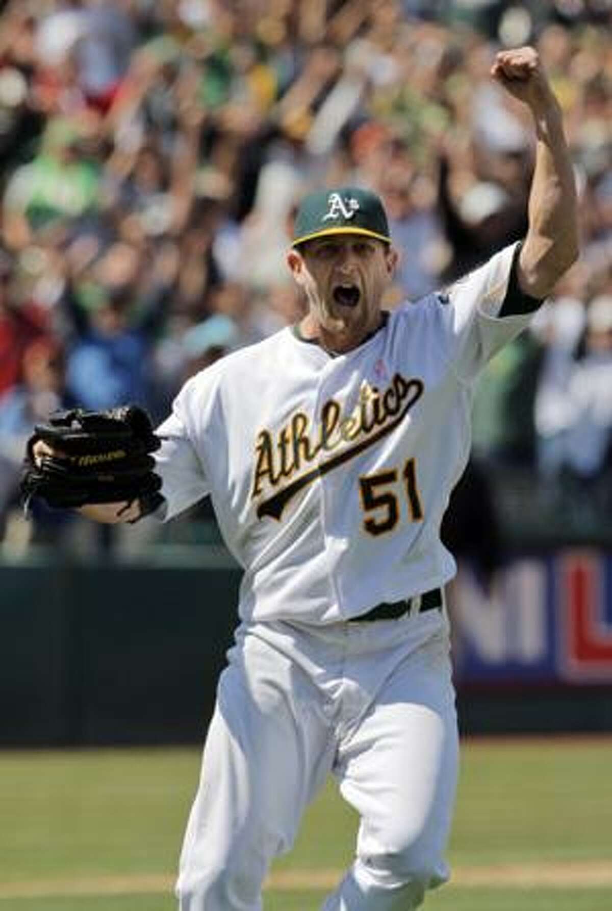 AP Photo/San Francisco Chronicle, Carlos Avila Gonzalez Oakland Athletics starting pitcher Dallas Braden celebrates throwing a perfect game against the Tampa Bay Rays during a baseball game in Oakland, Calif., Sunday. Braden pitched the 19th perfect game in major league history, a dazzling performance for the Athletics in a 4-0 victory.