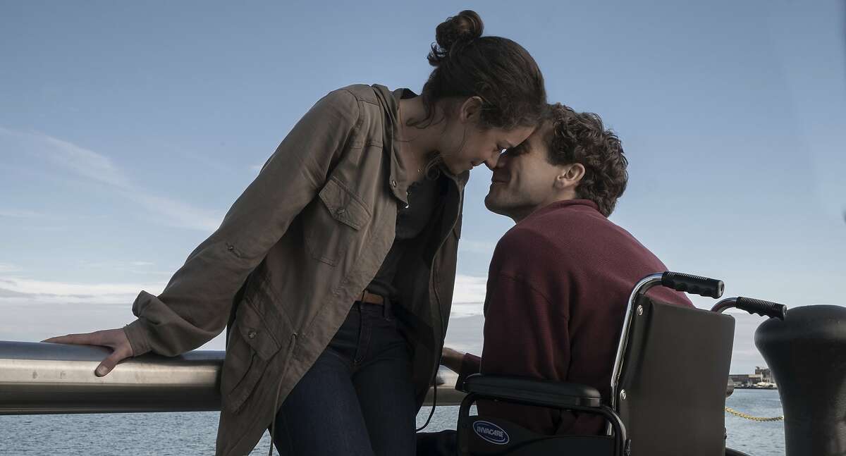 This image released by Roadside Attractions shows Tatiana Maslany, left, and Jake Gyllenhaal in a scene from "Stronger." (Scott Garfield/Lionsgate and Roadside Attractions via AP)
