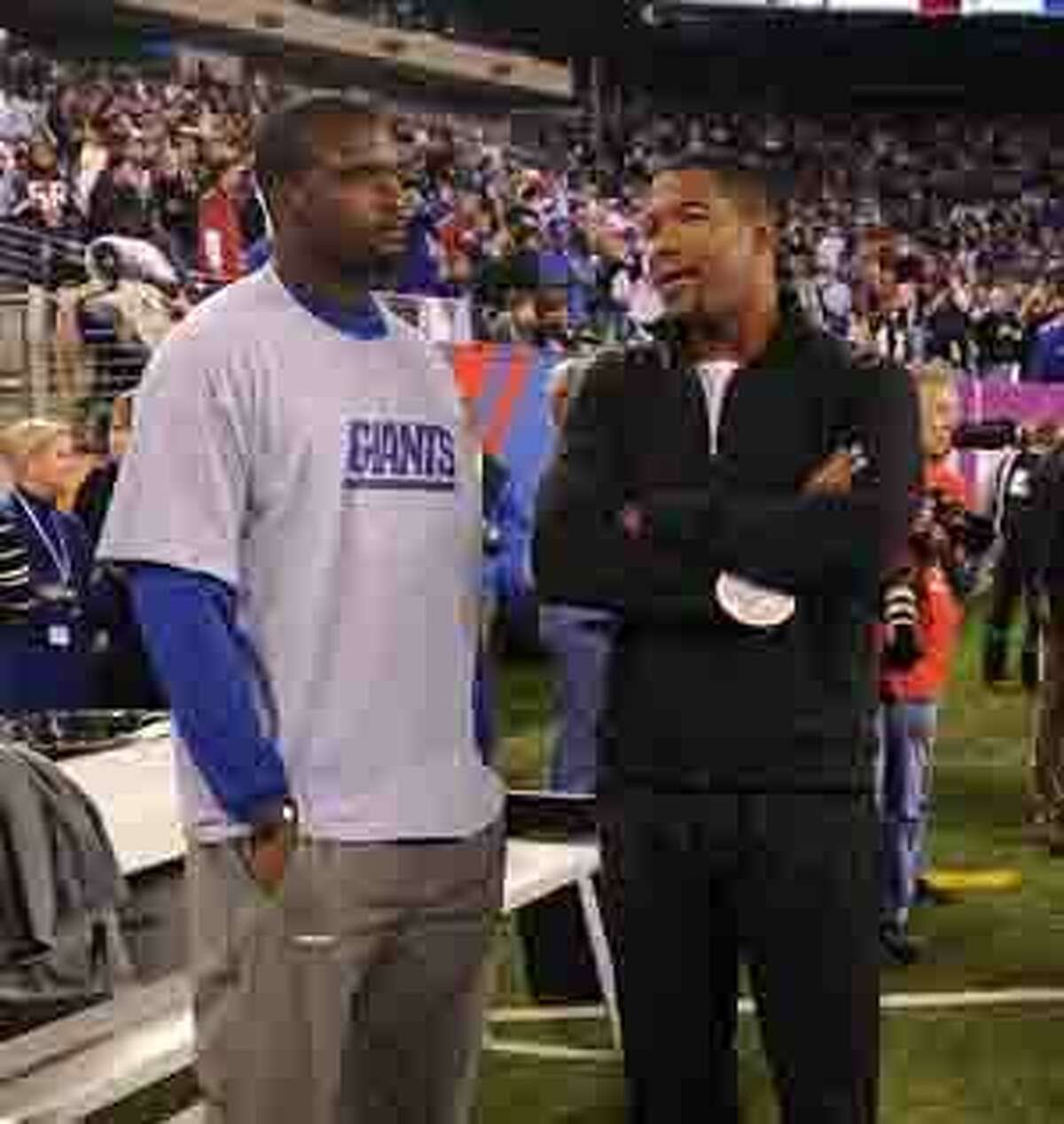 Wait for Giants jersey retirement a sore spot for Michael Strahan