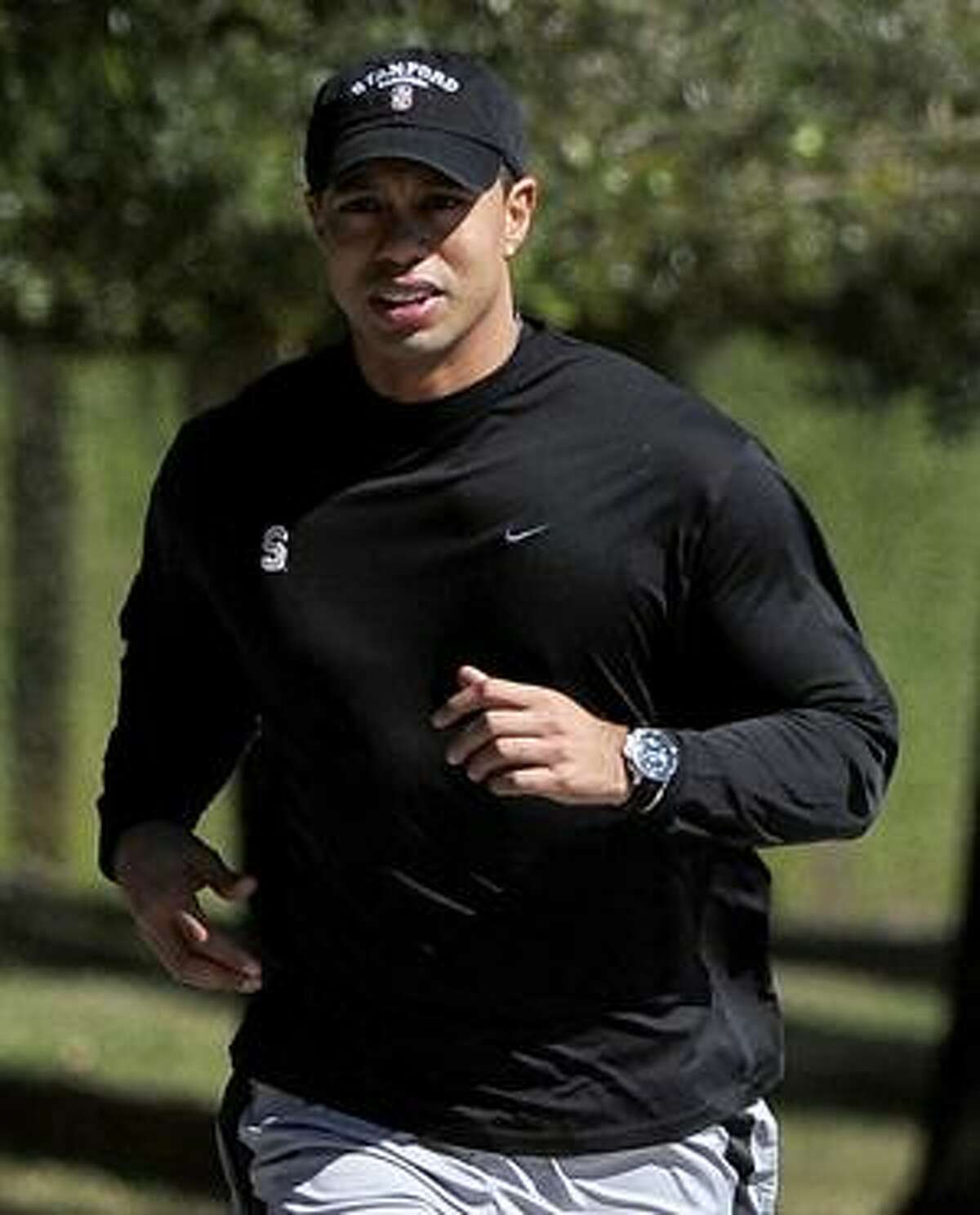 AP Tiger Woods jogs near his home Wednesday in Windermere, Fla. Woods will end nearly three months of silence Friday when he speaks publicly for the first time since his middle-of-the-night car accident sparked stunning revelations of infidelity. It will be Woods' first public appearance since Nov. 27, 2009.