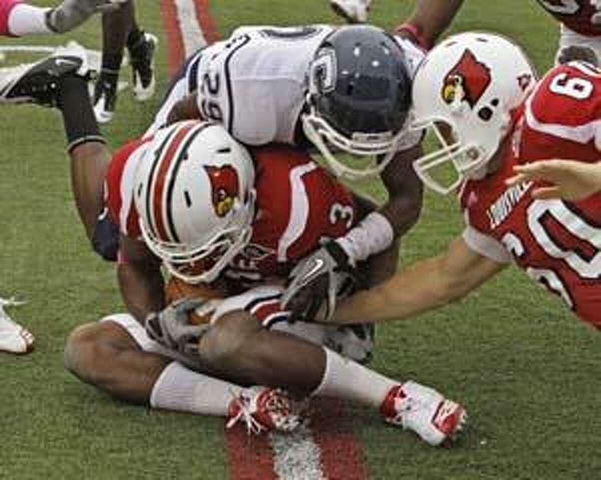 Louisville overwhelmed by the Huskies