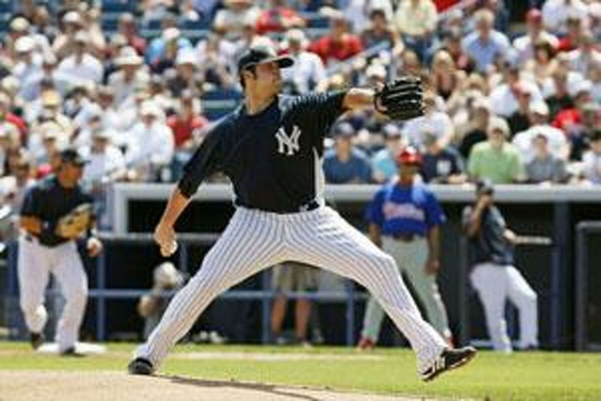 NY Yankees pitcher Chien-Ming Wang says he will meet with doctor