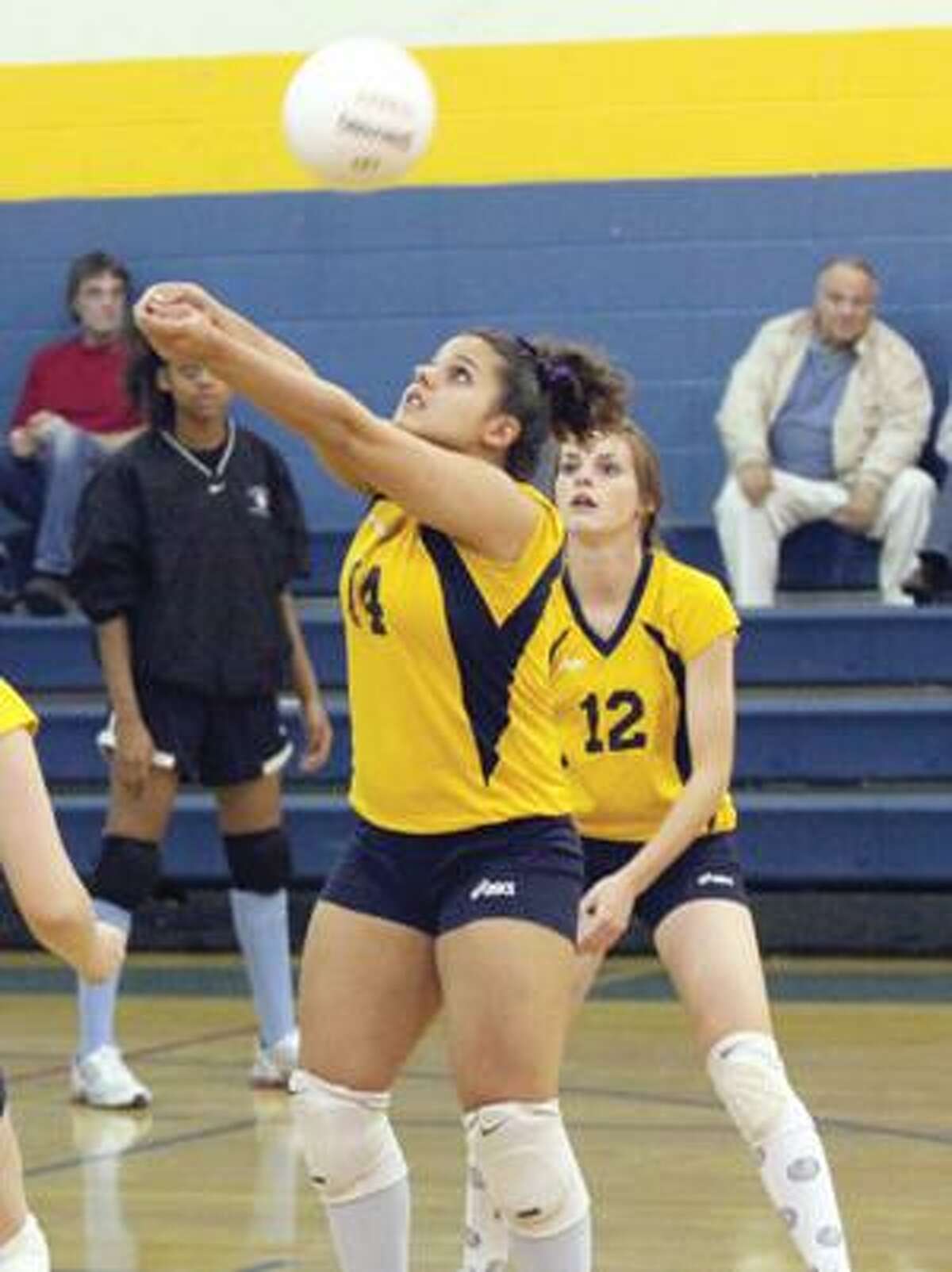 Gilbert's Frankie Marino returns a serve against Sports & Medical Sciences Academy Friday in Winsted.