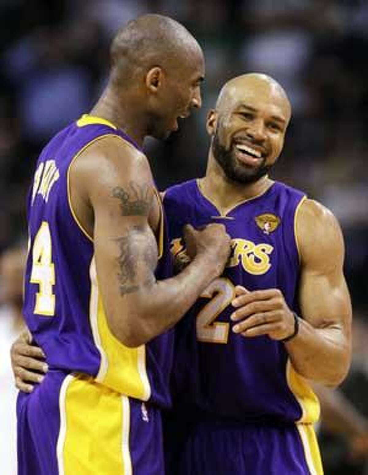 AP Los Angeles Lakers guards Kobe Bryant, left, and Derek Fisher react during the fourth quarter in Game 3 of the NBA finals against the Boston Celtics on Tuesday in Boston.