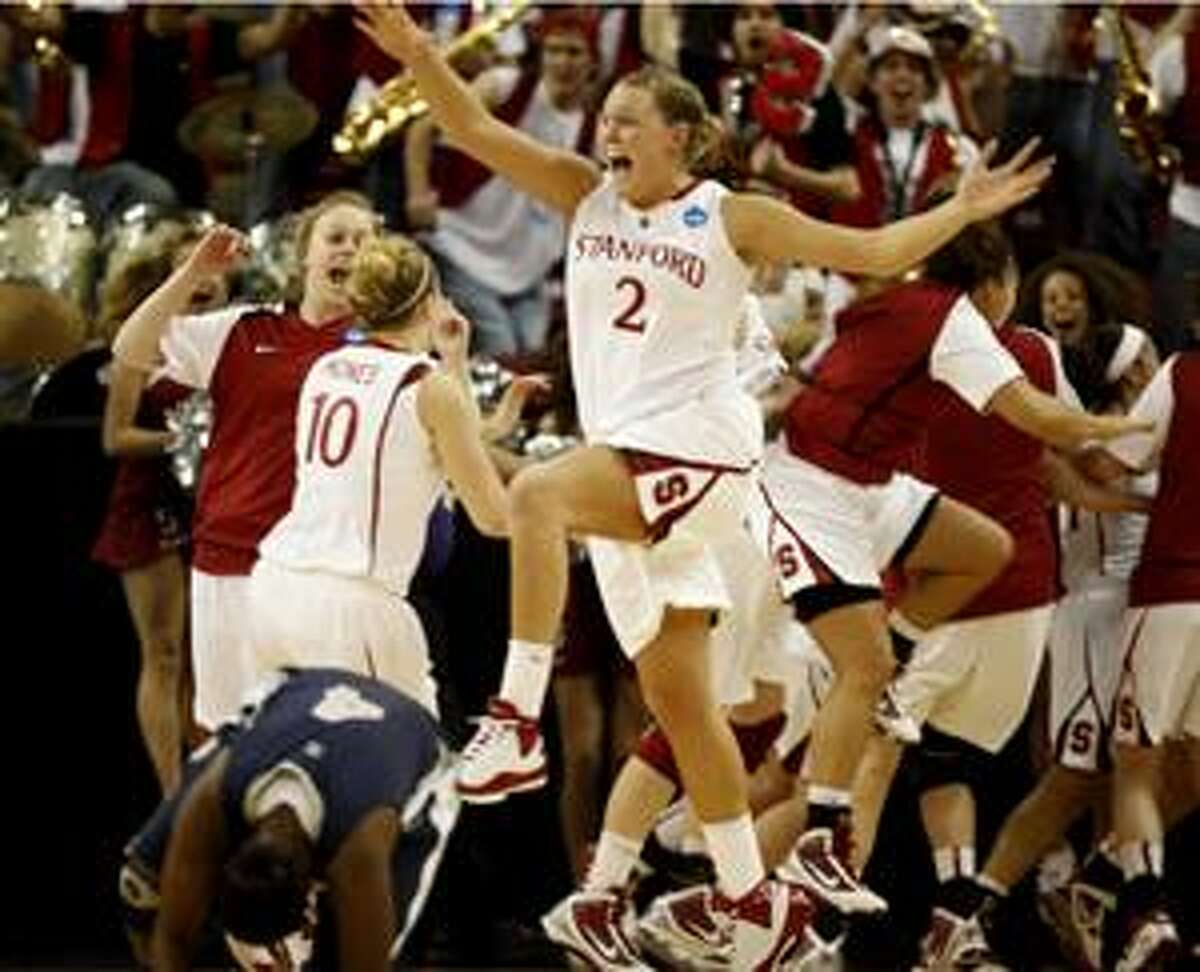 Stanford's Jayne Appel leaps after Stanford beat Xavier 55-53 in the final of the NCAA college basketball tournament Sacramento Regional in Sacramento, Calif., Monday, March 29, 2010. (AP Photo/Steve Yeater)