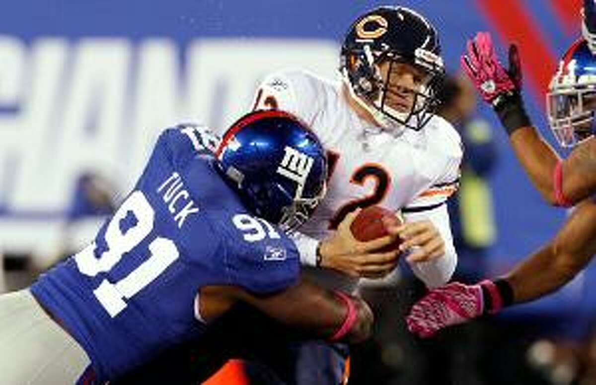 New York Giants defensive tackle Barry Cofield holds up a