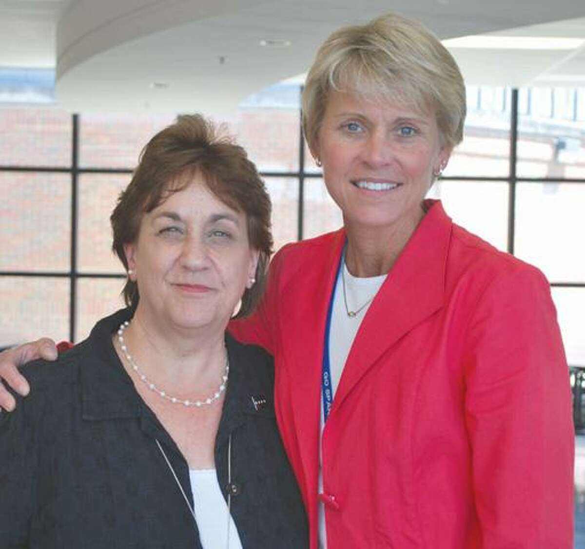 Lewis Mills' newly appointed principal Pam Lazaroski, left, and departing principal Karissa Niehoff is pictured on the right.
