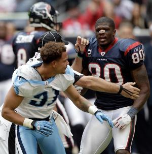 Tennessee Titans Cortland Finnegan intercepts a St. Louis Rams Sam Bradford  pass in the first quarter