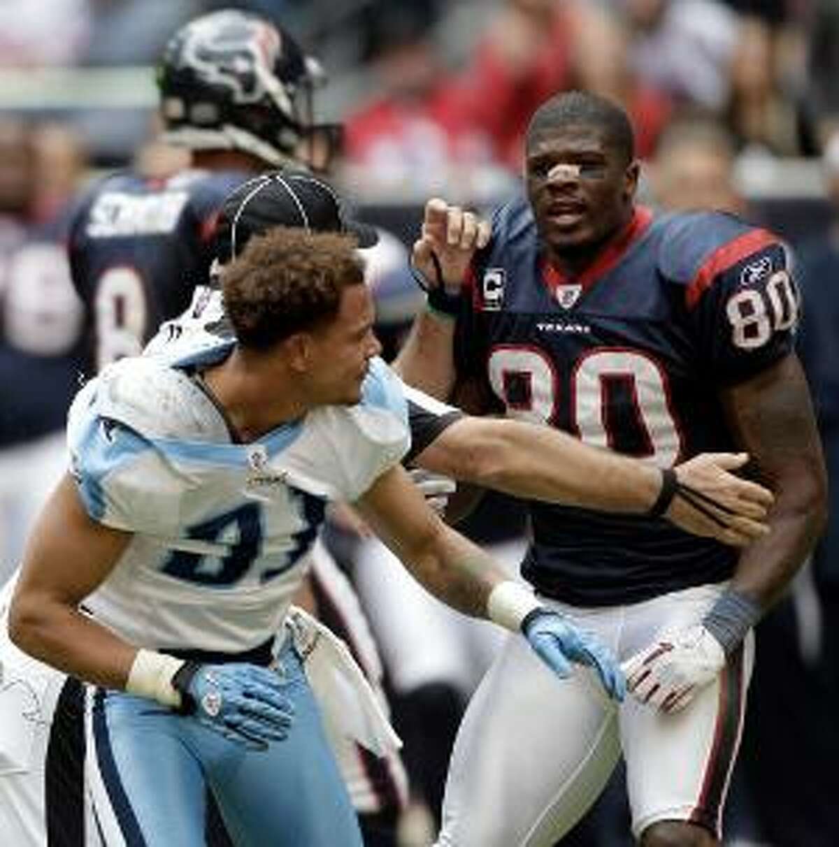 WEB FIRST: Houston Texans WR Andre Johnson and Tennessee Titans cornerback  Cortland Finnegan fight during game; Texans win 22-0